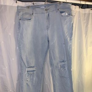 Light wash Boyfriend fit jeans, frayed hem.